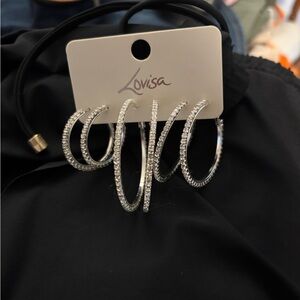 Sparkle on New Years Eve
Set of three crystal hoop earrings from  brand Lovisa.